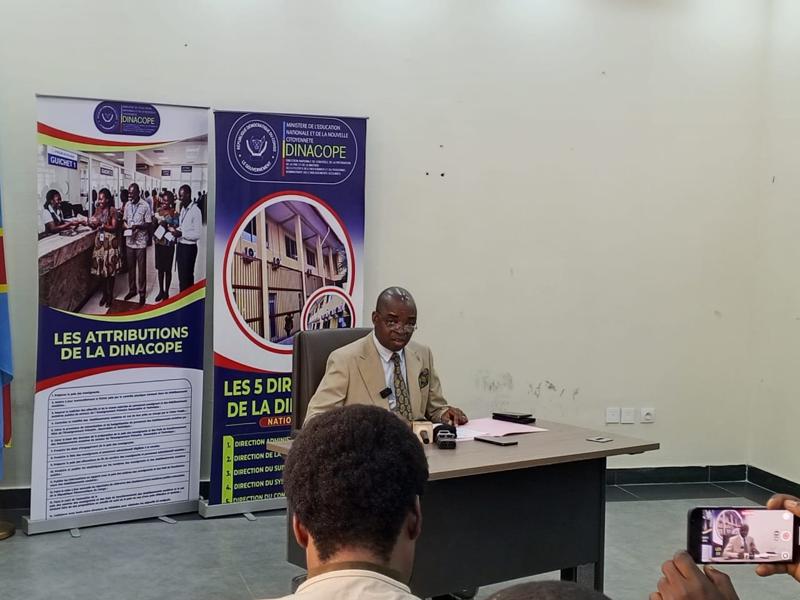 Le Directeur national de la Dinacope, Vital Lumbala lors d'un point de presse, mercredi 12 août 2026, à Kinshasa.<br /> <br />Radio Okapi/Ph. Blaise Ndongala Mayanda 20260813123336487448_WhatsApp_Image_2026-08-13_at_07.49.15.jpeg?imgmax=800